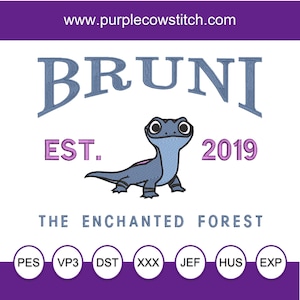 May include: Embroidered design featuring a blue salamander with pink accents, the text "BRUNI EST. 2019 THE ENCHANTED FOREST", and a selection of file formats: PES, VP3, DST, XXX, JEF, HUS, EXP.