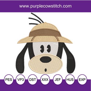 May include: An embroidery design featuring a cartoon dog head wearing a tan safari hat with a brown band. The dog has long black ears, a white face, and a tan muzzle with a black nose. The text www.purplecowstitch.com and file formats PES, VP3, DST, XXX, JEF, HUS, EXP appear.