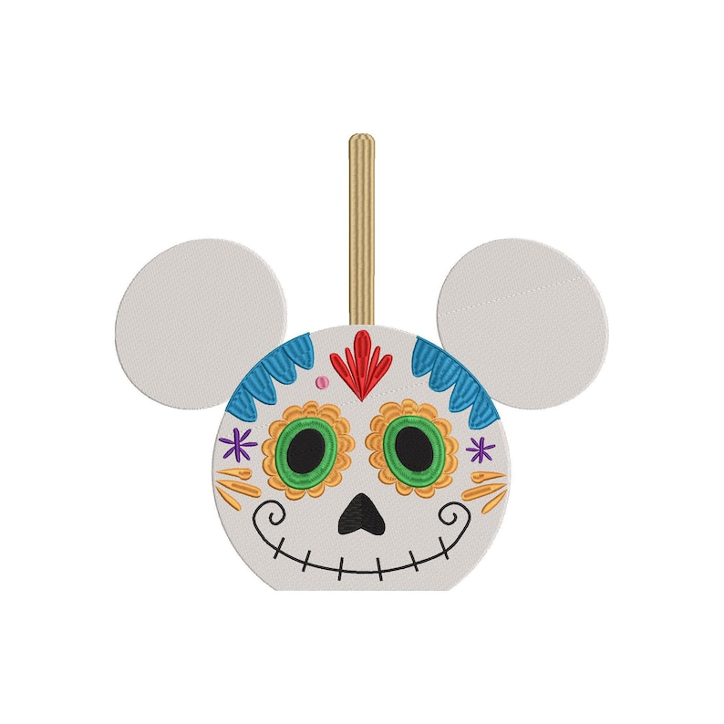 May include: A white and blue sugar skull ornament with Mickey Mouse ears. The skull has a colorful Day of the Dead design with green eyes, a red nose, and yellow flowers.
