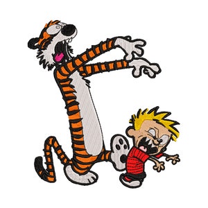 Wzór haftu maszynowego inspirowany komiksami Calvina i Hobbsa.