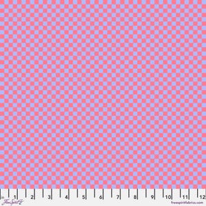May include: Pink and light blue checkered fabric with a subtle texture. The fabric is shown with a ruler for scale.