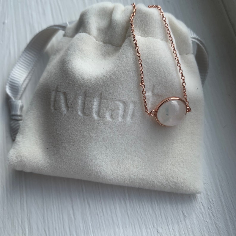 rose gold birthstone bracelet with velvet pouch