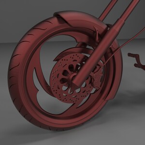 May include: A close-up of a red motorcycle wheel with a detailed spoke design and a red disc brake. The wheel has a black tire and a red fender.