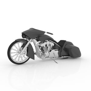 May include: A black custom motorcycle with a chrome engine and wheels. The motorcycle has a low profile and a sleek design.