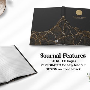May include: Black journal with a gold mountain design on the front and back covers. The journal has 150 ruled pages and is perforated for easy tear out.