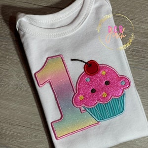 Customized Sparkling First Birthday Cupcake T-Shirt.