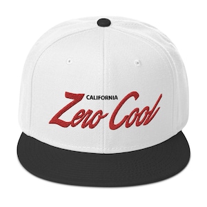 May include: White and black baseball cap with a red embroidered logo that says "CALIFORNIA Zero Cool".