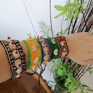 Handcrafted embroidered colourful  bracelet decorated with tiny Shells