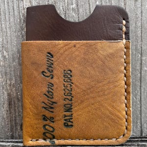 Cartera minimalista con diseño de guante de béisbol Rawlings: billetera con bolsillo frontal y tarjetero