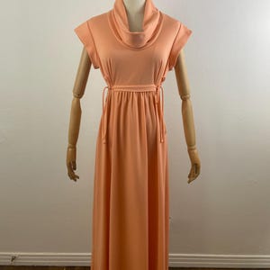 Vintage 70s Melon Orange 1/2 Cap Sleeves With Drop Turtleneck Maxi-Long Bohemian Disco Poly Dress By USA, Size-14. Drape Waistband & Ribbon.