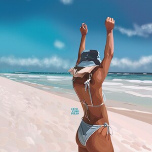 May include: A woman wearing a blue bikini and a blue bucket hat stands on a white sandy beach with her arms raised in the air. The ocean is in the background.