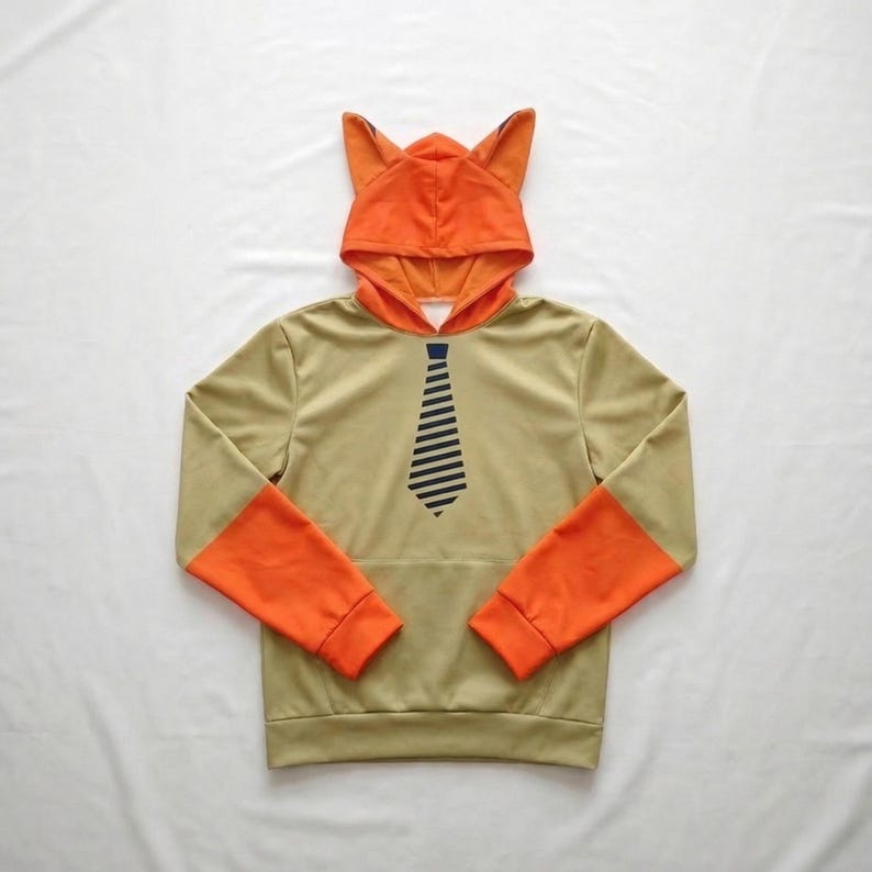 Close-up of the unlined, breathable heavy-blend fabric on a custom fursona sweatshirt, showing the durable stitching on the animal ears.