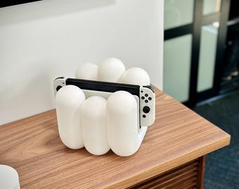 Soporte Cloudform impreso en 3D para Nintendo Switch: minimalista y moderno, accesorio divertido para juegos.