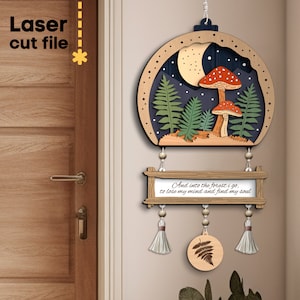 May include: Wooden wall hanging with a crescent moon, stars, and mushrooms in a forest scene. The hanging has a quote: "And into the forest I go, to lose my mind and find my soul."