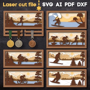Könnte beinhalten: Lasergeschnittene Datei im SVG-, AI-, PDF- und DXF-Format. Das Bild zeigt mehrere Holzrahmen-Kunstwerke, die verschiedene Sportarten und Outdoor-Aktivitäten darstellen, darunter Laufen, Surfen und Skifahren. Ebenfalls enthalten sind drei Medaillen.