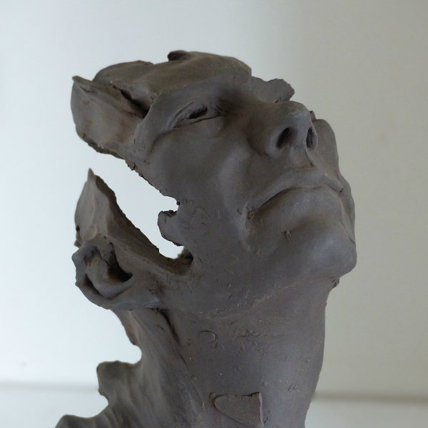 Sculpture visage, terre cuite