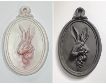 Wall portrait of a hare, in the shape of a medallion, plaster sculpture