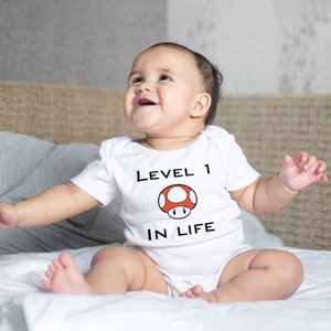 Super Mario Baby Video Game Player Bodysuit: Level 1 Gamer Infant Romper, Funny Toddler Onesie Sleepsuit - White/pink newborn shower gift