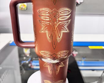 Western Boot stitch tumbler wrap on a Brown gold plated bas.  Capacity 40oz