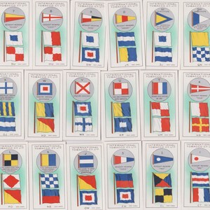 May include: A set of 24 vintage International Tobacco Co. Ltd. trading cards featuring the International Code of Signals flags. Each card has a different flag with its corresponding signal letter and a description of the signal.