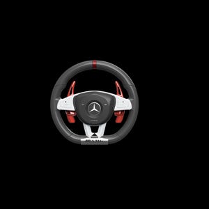 May include: A black and gray steering wheel with red accents and white paddle shifters. The center features a silver emblem and the word "AMG" is visible at the bottom. The steering wheel has a red stripe at the top.