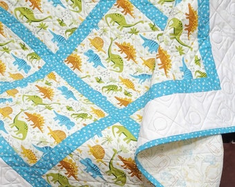 Handgemaakte dinosaurusbabyquilt, patchwork katoenen deken