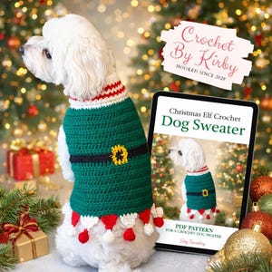 May include: A white dog wearing a green, red, and white crochet Christmas Elf Dog Sweater. The sweater has a black belt with a gold buckle. A tablet displays the sweater design. Text reads "Crochet By Kirby" and "Christmas Elf Crochet Dog Sweater."