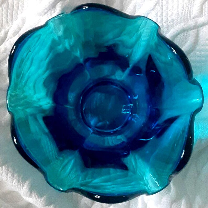 Top-down view of wavy edges and vibrant blue color.