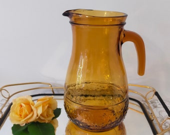 Vintage amber glass jug or pitcher made in Italy from the 60s/70s/ rare amber molded glass carafe with stamped arabesques