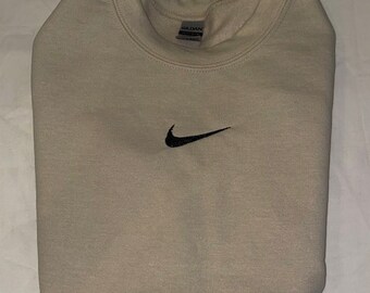 nike hoodie tick in middle