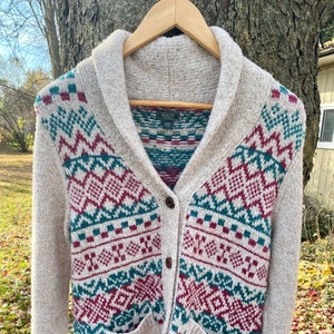 Roots curling sweater clearance