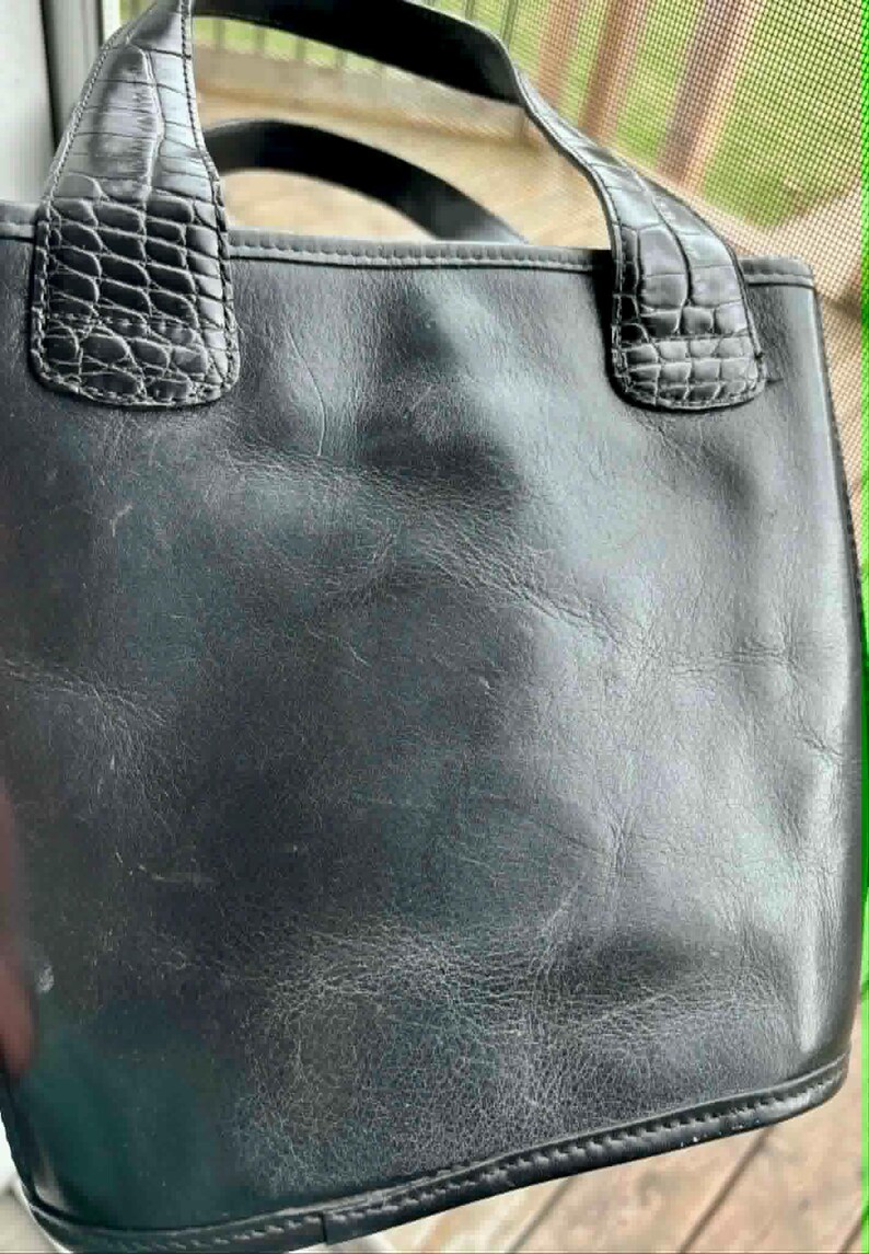 May include: A set of three ceramic mugs with a speckled, matte finish. The mugs are in shades of cream, light gray, and dark gray. Each mug has a simple, minimalist design, perfect for coffee or tea.