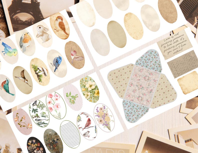 May include: A collection of printed paper ephemera featuring oval stickers with watercolor illustrations of birds, flowers, and botanical elements, alongside a floral patterned envelope template and a rectangular card with the text Love is not finding someone to live with, it's finding someone you can't live without.