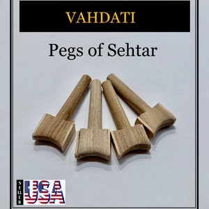 May include: Four wooden pegs for a Sehtar, a traditional Persian instrument. The pegs are light brown with a rectangular head and a tapered body. The text "VAHDATI" and "Pegs of Sehtar" are displayed in the image.