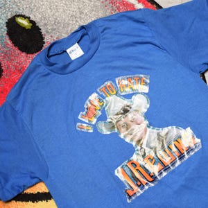 80s vintage Dallas shirt Size modern Small Vtg blue I love to hate J R Ewing soap opera serial promo tee Sz S