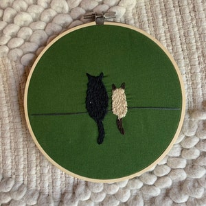Stitched cat embroidery hoop