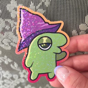 little green smile guy sticker