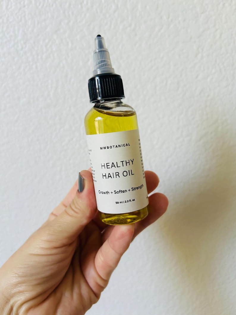 Herbal Hair Oil/Rosemary Hair Oil/Soften,Strength Hair Oil/Growth Hair Oil/Natural Hair Growth Oil with Rosemary , Clove and Castor Oil 2 oz