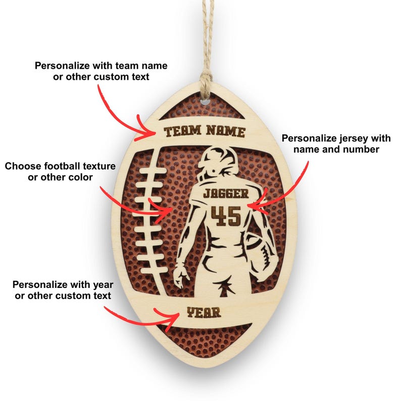 May include: A wooden football-shaped ornament with a football texture background. The ornament features a football player silhouette with the name "JAGGER" and the number "45". The text "TEAM NAME" and "YEAR" are at the top and bottom, respectively. Includes a string for hanging.