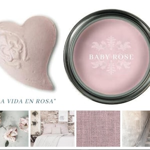 May include: A pink paint can with the text "BABY ROSE" and the phrase "LA VIDA EN ROSA" below. The paint can is surrounded by images of pink roses, a pink heart, and a pink fabric.