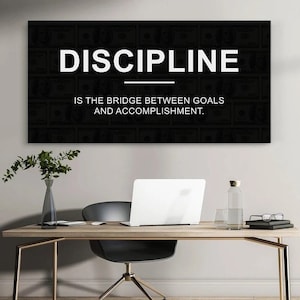 May include: Black and white motivational quote on a canvas print. The quote reads "Discipline is the bridge between goals and accomplishment."