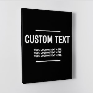May include: Black and white canvas print with the text "CUSTOM TEXT" and the words "YOUR CUSTOM TEXT HERE." repeated three times.