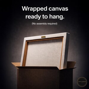 May include: A wrapped canvas print, ready to hang, is shown partially inside a cardboard box. The canvas has a white border and a wooden frame. The text on the image reads: "Wrapped canvas ready to hang. (No assembly required)"