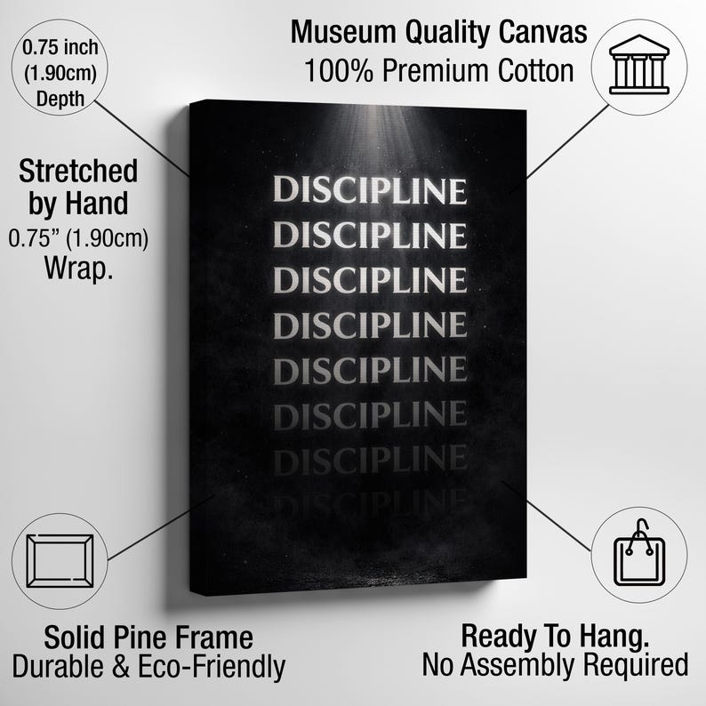 May include: A black canvas print with the word "DISCIPLINE" repeated in a vertical pattern. The canvas is stretched by hand and has a depth of 0.75 inches (1.90cm). The canvas is made of 100% premium cotton and is ready to hang.