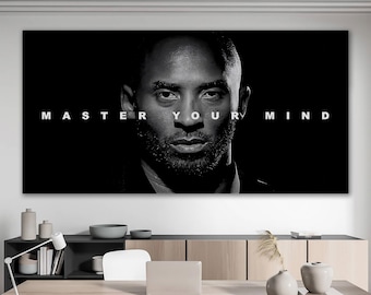 May include: Black and white portrait of a man with the text "MASTER YOUR MIND" in white letters. The image is a close-up of the man's face, with a serious expression. The background is black, and the image is displayed on a wall.