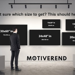 May include: A white wall with black frames displaying different sizes of canvas prints. The sizes are listed in inches and centimeters. The text "Not sure which size to get? This should help." is at the top of the wall. The text "MOTIVEREND" is at the bottom of the wall.