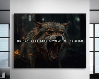 May include: A black and white motivational poster featuring a wolf with its mouth open, snarling. The text on the poster reads "BE FEARLESS LIKE A WOLF IN THE WILD."