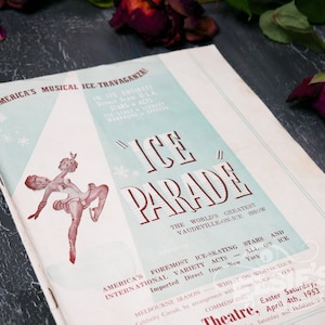 May include: A vintage programme for "Ice Parade", a vaudeville-on-ice show. The programme features a red and white illustration of a woman ice skating. The text on the programme reads "America's Musical Ice Travaganza" and "The World's Greatest Vaudeville-on-Ice Show".