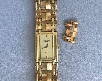 Authentic Swiss-made LONGINES QWR Gold Classic Watch With