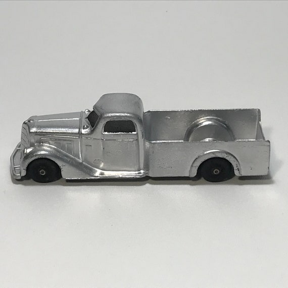 Antique metal sales toy trucks